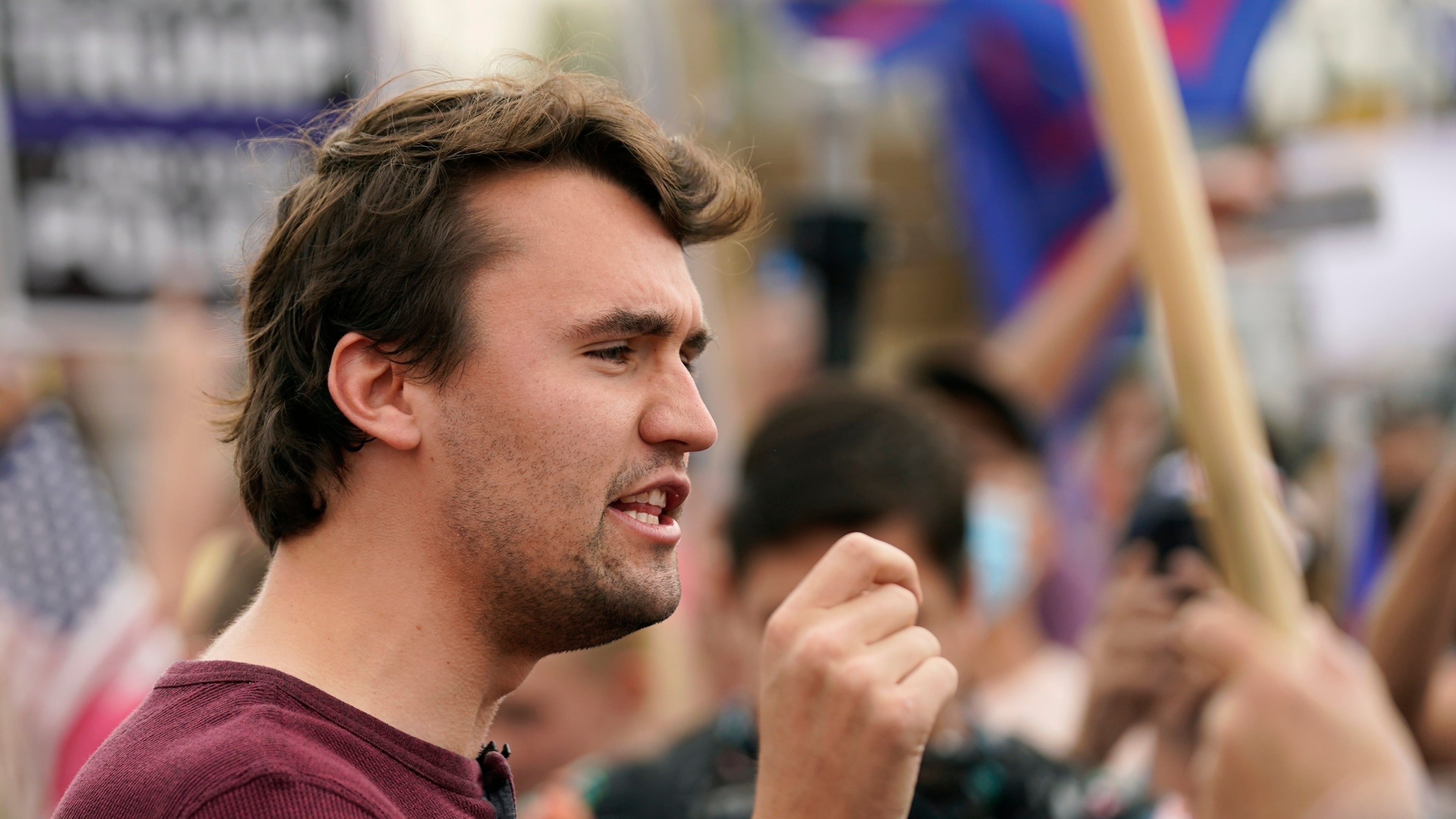FILE - Charlie Kirk, conservative activist and founder of Turning Point USA, speaks to supporters of President Donald Trump at a rally outside the Maricopa County Recorder's Office, Friday, Nov. 6, 2020, in Phoenix. (AP Photo/Ross D. Franklin, File)