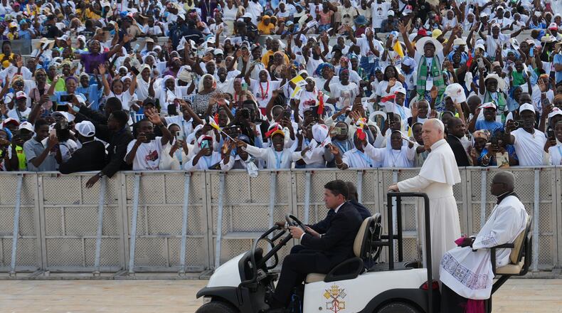 Pope Leo XIV arrives at the esplanade in front of the Sanctuary of Mama Muxima, in Muxima, Angola, Sunday, April 19, 2026. (AP Photo/Andrew Medichini)