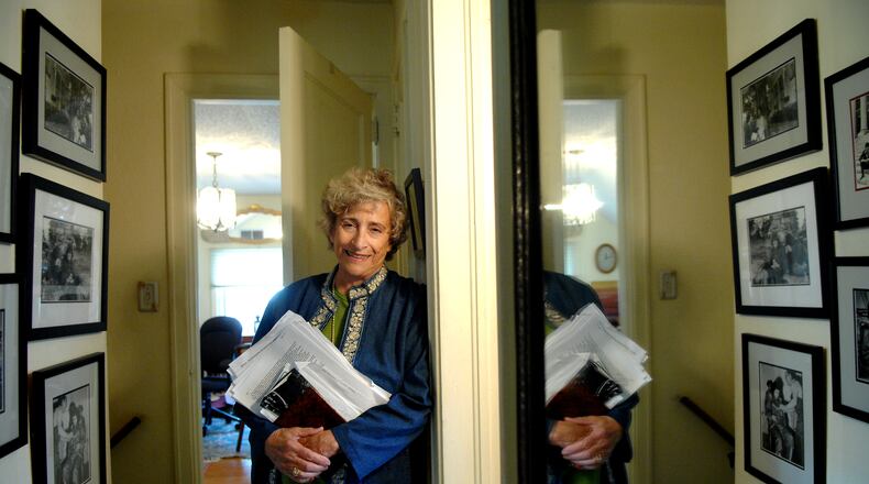 Kathryn Johnson, who covered the Civil Rights movement and other major stories of the 1960's and 1970's for The Associated Press and is featured in a book about the AP, at her home in Atlanta's Morningside neighborhood. RICH ADDICKS/AJC File