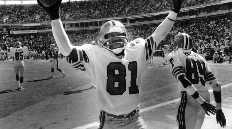 Billy "White Shoes" Johnson of the Falcons reacts after scoring a touchdown in the third quarter against Denver on September 22, 1985. (JOEY IVANSCO/AJC staff)