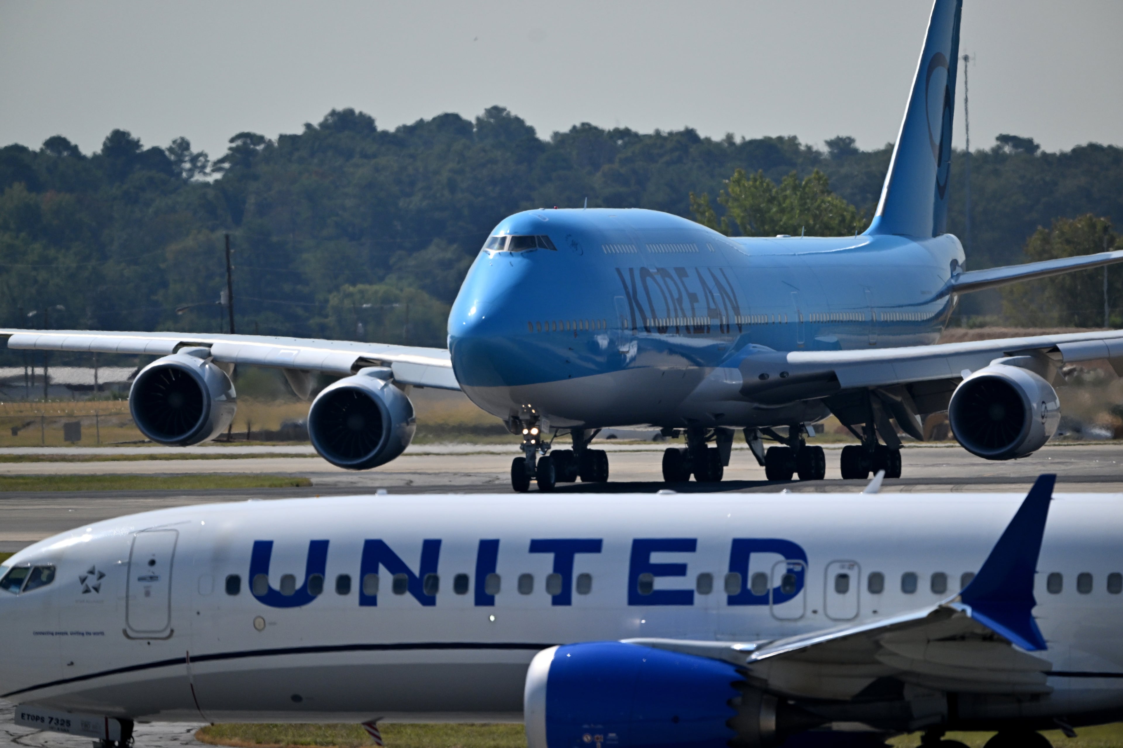 A Korean Air charter plane carrying Korean workers detained in immigration raid leaves the Hartsfield-Jackson International Airport, Thursday, September 11, 2025, in Atlanta. (Hyosub Shin / AJC)