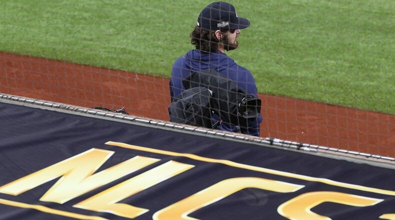 Ian Anderson takes in the scene for the NLCS from the team dugout during their workout for the best-of-seven National League Championship Series against the Dodgers at Globe Life Field on Sunday, Oct 11, 2020 in Arlington.