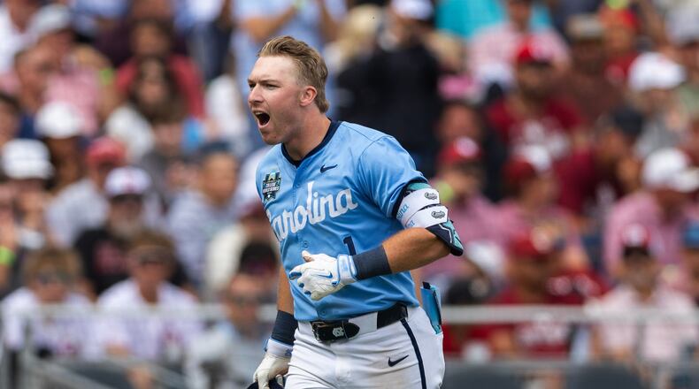 North Carolina's Cooper Nicholson celebrates after hitting a two-run home run against Oklahoma in the seventh inning of Game 2 of the NCAA College World Series baseball finals in Omaha, Neb., Sunday, June 21, 2026. (AP Photo/Rebecca S. Gratz)