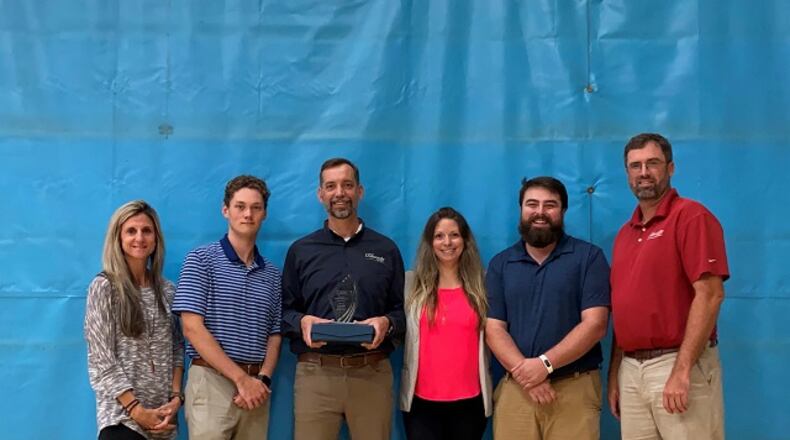 Dunwoody employees celebrating their award are (L-R) Recreation Program Leader Kate Borden, Recreation Program Leader Ian McLeod, Director Brent Walker, Recreation Program Supervisor Rachel Waldron, Park Operations Coordinator A.J. Beck-DeBlasi and Park Operations Manager Gabe Neps. (Courtesy of Dunwoody)