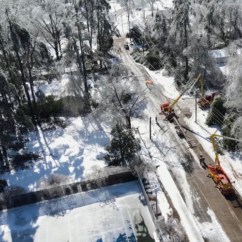 This image taken from a video released by the city of Oxford, Miss., shows crews working on power lines Tuesday, Jan. 27, 2026. (City of Oxford Mississippi via AP)