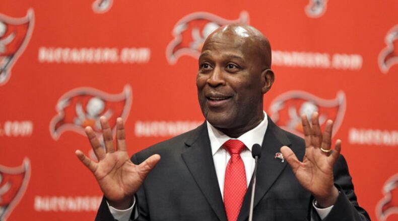 Tampa Bay Buccaneers new head coach Lovie Smith gestures during an NFL football news conference Monday, Jan. 6, 2014, in Tampa, Fla. Smith, a one-time Bucs assistant, replaces Greg Schiano, who was fired after the season ended. Smith coached the Chicago Bears for nine seasons from 2004 to 2012, winning 81 games, three division championships, two NFC title game appearances and one Super Bowl berth. He coached Falcons wide receiver/returner during his team with the Bears. (AP Photo/Chris O'Meara) CHRIS O'MEARA — AP Read more here: http://www.bradenton.com/2014/05/11/5147885/commentary-playing-poker-against.html#storylink=cpy