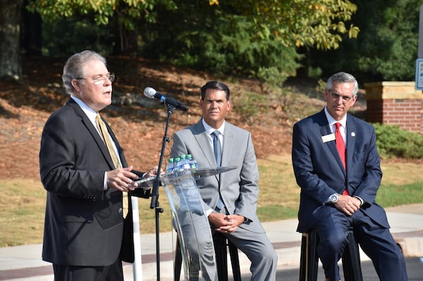 In 2019, then-Lt. Gov. Geoff Duncan (center) and Secretary of State Brad Raffensperger (right) sat side-by-side at event featuring Mike Mason, the mayor of Peachtree Corners.