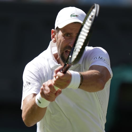 FILE - Novak Djokovic, of Serbia, returns the ball to Roman Saffiullin, of Russia, in their fourth round men's singles match at the Wimbledon Tennis Championships in London, July 5, 2026. (AP Photo/Brian Inganga, File)