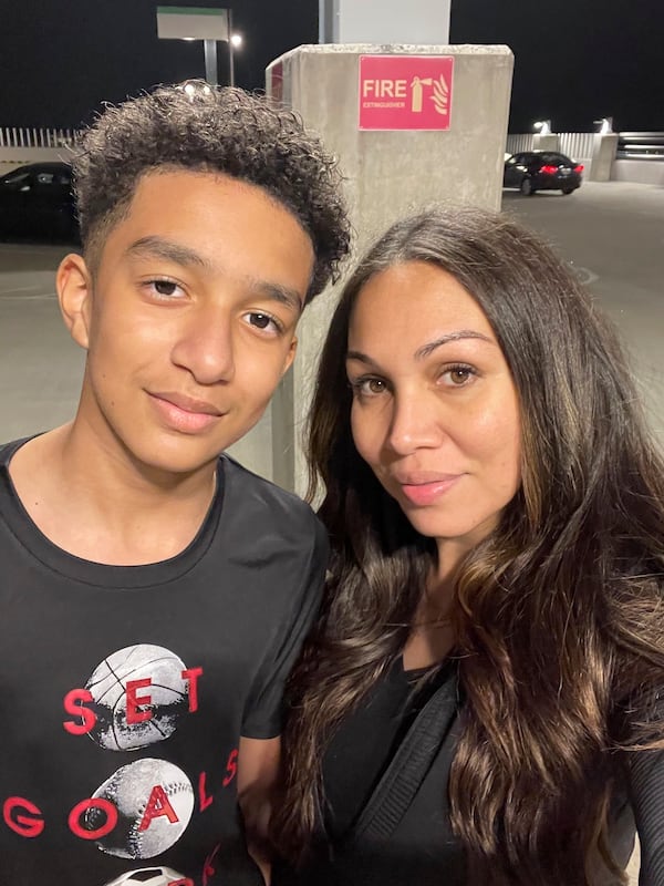 FILE - In this undated photo provided by Megan Garcia of Florida in October 2024, she stands with her son, Sewell Setzer III. (Megan Garcia via AP, File)