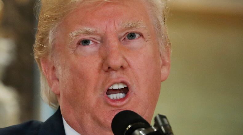 President Donald Trump speaks in the lobby of Trump Tower in New York, Tuesday, Aug. 15, 2017. (AP Photo/Pablo Martinez Monsivais)
