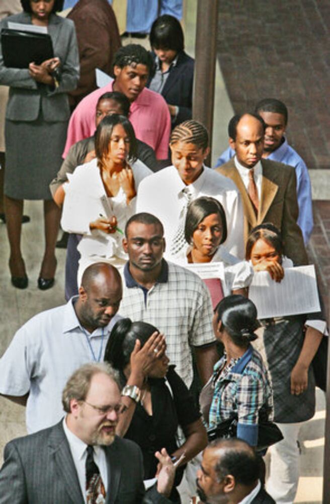 Job fair crowded as unemployment rises