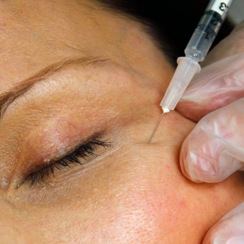 FILE - A patient receives a Botox injection at a clinic in Arlington, Va., on June 5, 2009. (AP Photo/Jacquelyn Martin, File)
