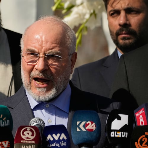 Iranian Parliament Speaker Mohammad Baqer Qalibaf addresses attendees at the site near Baghdad International Airport where Iranian military commander Qassem Soleimani was killed in a U.S. drone strike, in Baghdad, Iraq, Wednesday, Aug. 19, 2026.(AP Photo/Hadi Mizban)