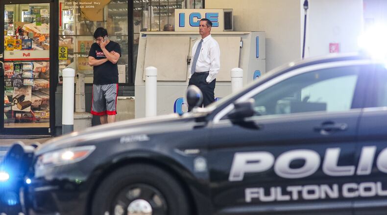 A gas station store clerk was shot in a possible robbery attempt Tues., May 10, 2016m in south Fulton County. JOHN SPINK / JSPINK@AJC.COM
