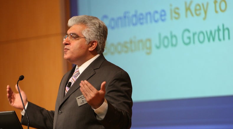 Rajeev Dhawan, director of Georgia State’s economic forecasting center, expects hiring to pick up later this year but remain lower than in 2016. Vino Wong vwong@ajc.com