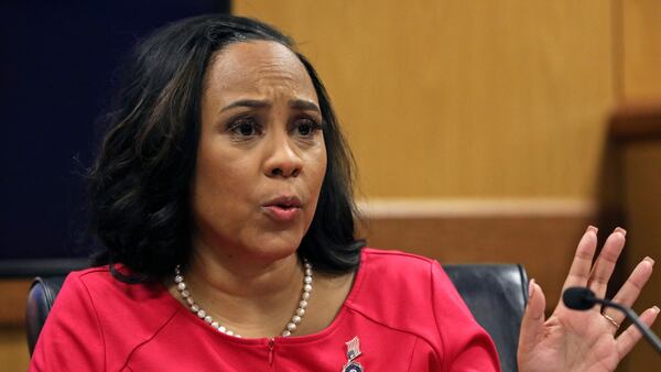 Fulton County District Attorney Fani Willis testifies during a hearing on the Georgia election interference case, Thursday, Feb. 15, 2024, in Atlanta. The hearing is to determine whether Willis should be removed from the case because of a relationship with Nathan Wade, special prosecutor she hired in the election interference case against former President Donald Trump. (Alyssa Pointer/Pool Photo via AP)