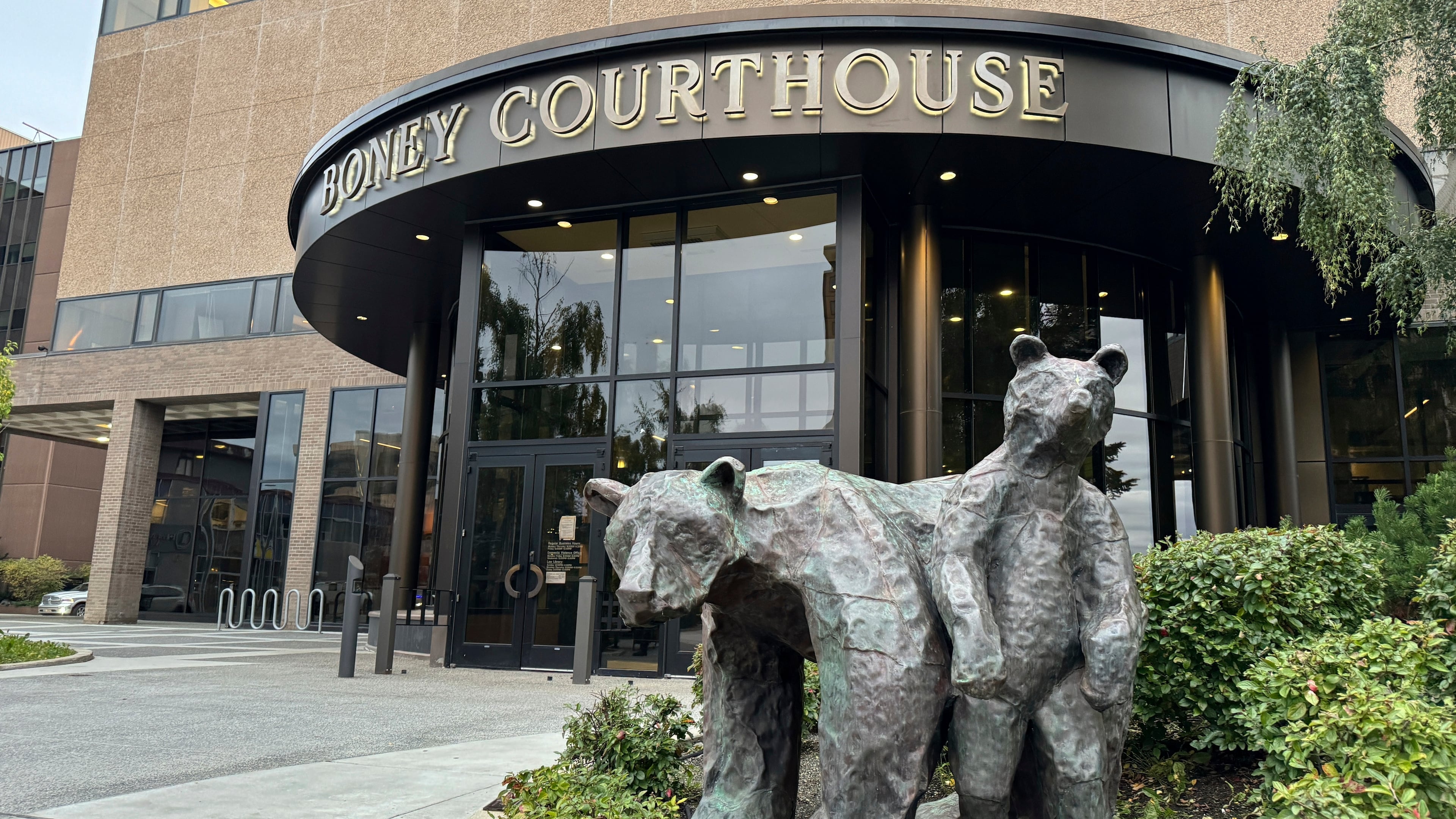 FILE - Bear sculptures sit outside the Boney Courthouse, where the Alaska Supreme Court hears cases, in downtown Anchorage, Alaska, Sept. 10, 2024. (AP Photo/Mark Thiessen, File)