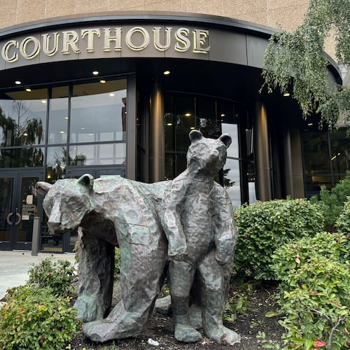 FILE - Bear sculptures sit outside the Boney Courthouse, where the Alaska Supreme Court hears cases, in downtown Anchorage, Alaska, Sept. 10, 2024. (AP Photo/Mark Thiessen, File)