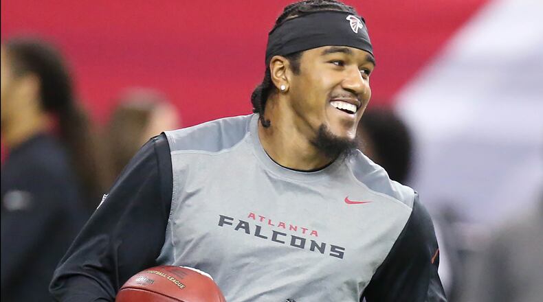 Falcons outside linebacker Vic Bealsey Jr. is all smiles as he switches over to offense and goes out to catch a pass during pregame warmups preparing to play the Saints in a football game on Sunday, Jan. 3, 2016, in Atlanta. Curtis Compton / ccompton@ajc.com