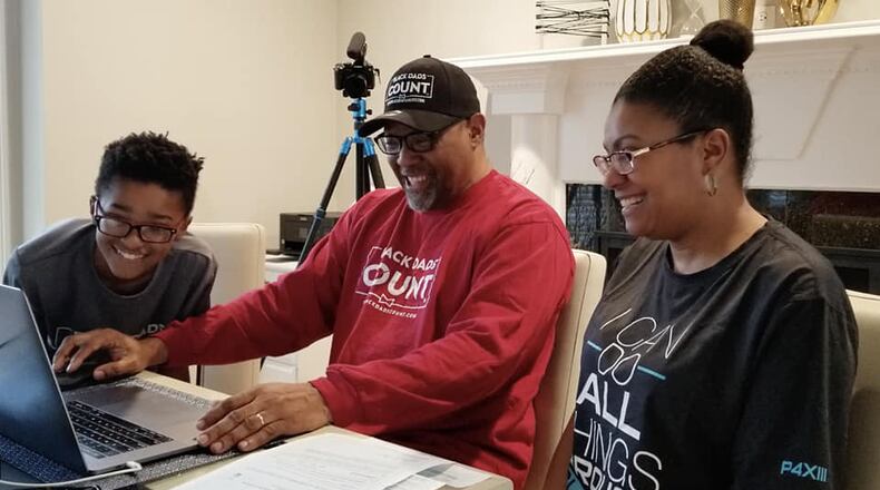 Educating and engaging their son are Kenny and Tracy Braswell filling out the 2020 U.S. Census. (Left: KJ, Kenny and wife Tracy). Photo contributed.