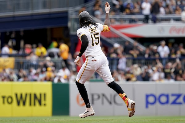 Pittsburgh Pirates' Oneil Cruz rounds the bases after hitting a home run during the third inning of a baseball game against the Milwaukee Brewers, Sunday, May 25, 2025, in Pittsburgh. (AP Photo/Matt Freed)