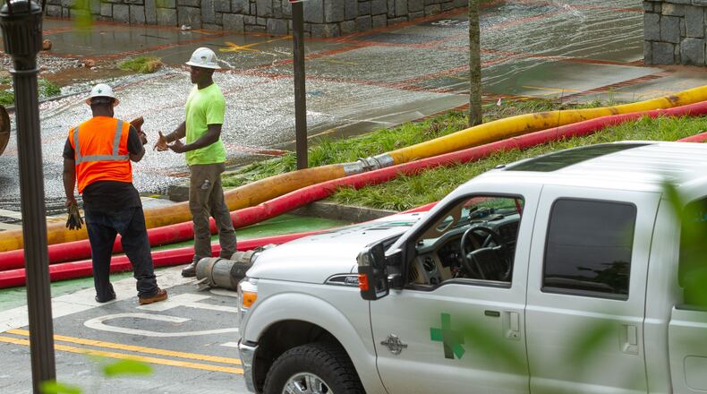Workers are pictured during a massive water main break at GA Tech in June. On Wednesday morning Fulton County crews worked on a water main break in Milton. STEVE SCHAEFER FOR THE ATLANTA JOURNAL-CONSTITUTION