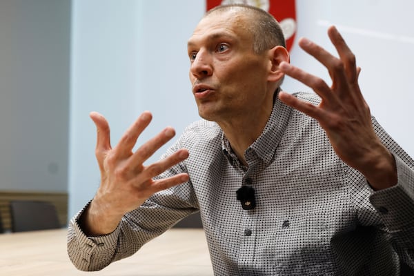 Syarhei Tsikhanouski, a Belarusian opposition activist released from a prison by Belarusian authorities, gestures during an interview with the Associated Press in Vilnius, Lithuania, Sunday, June 22, 2025. (AP Photo/Mindaugas Kulbis)