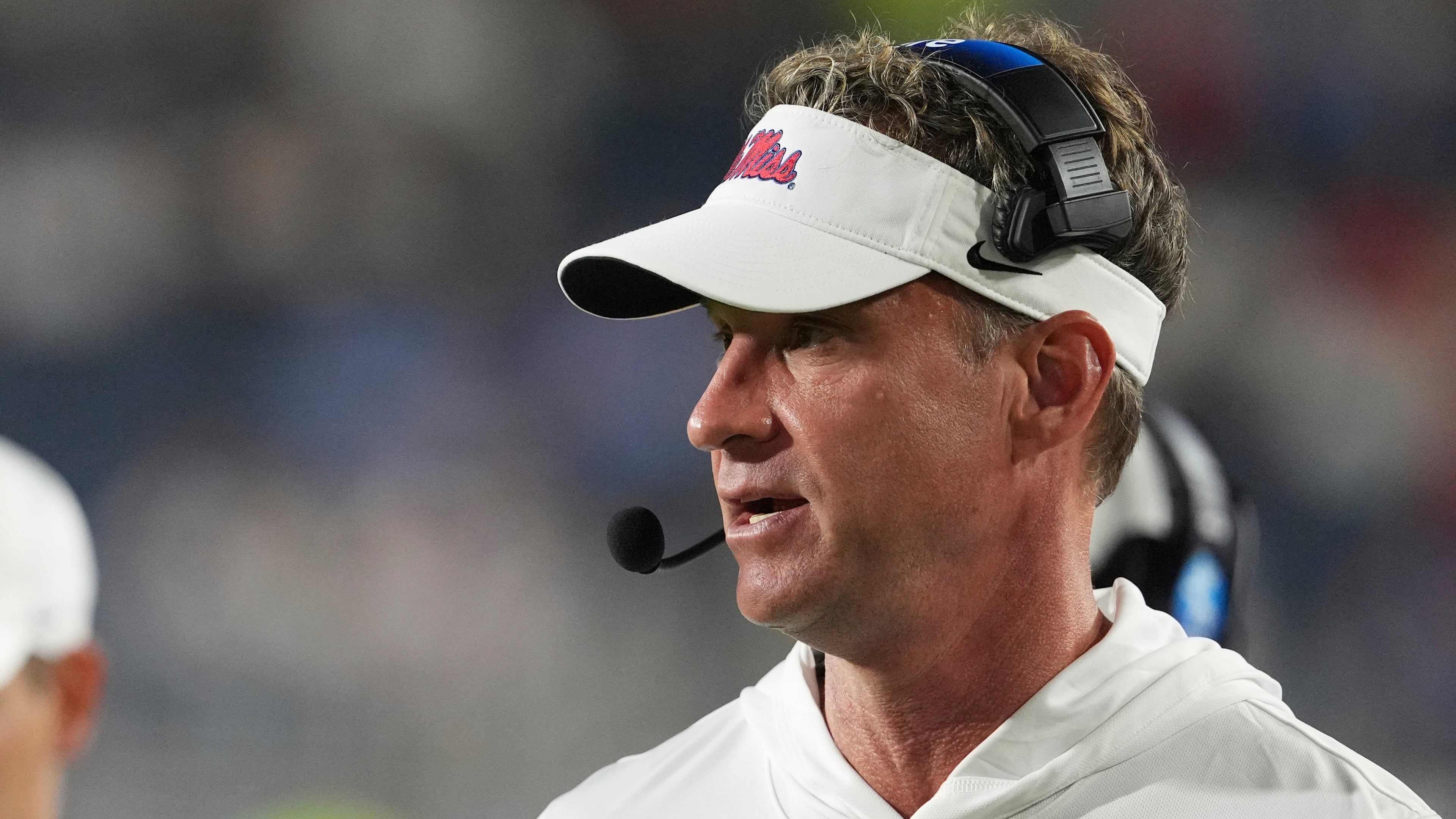 Mississippi head coach Lane Kiffin speaks to his coaches in the booth during the second half of an NCAA college football game against Georgia State in Oxford, Miss., Saturday, Aug. 30, 2025. (Rogelio V. Solis/AP)
