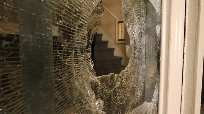 Two men were found dead about 6:30 p.m. Sunday night inside an apartment in the 200 block of Franklin Road in Sandy Springs. JOHN SPINK / JSPINK@AJC.COM