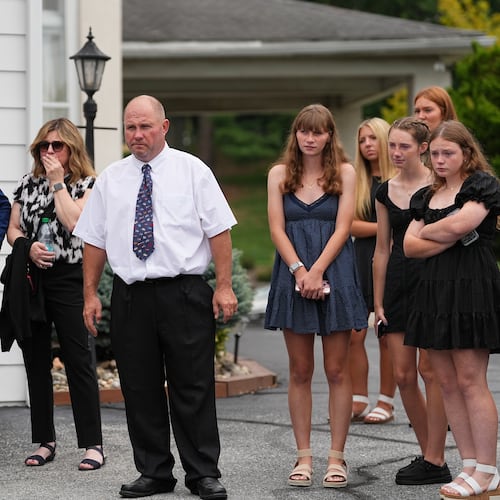 Glenwood Pysher III, watches as pallbearers carry a casket containing the remains of his son Glenwood "Bubba" Pysher IV who was killed by police, in Pottstown, Pa., Monday, Aug. 31, 2026. (AP Photo/Matt Rourke)