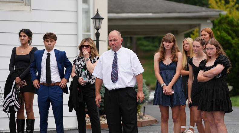 Glenwood Pysher III, watches as pallbearers carry a casket containing the remains of his son Glenwood "Bubba" Pysher IV who was killed by police, in Pottstown, Pa., Monday, Aug. 31, 2026. (AP Photo/Matt Rourke)