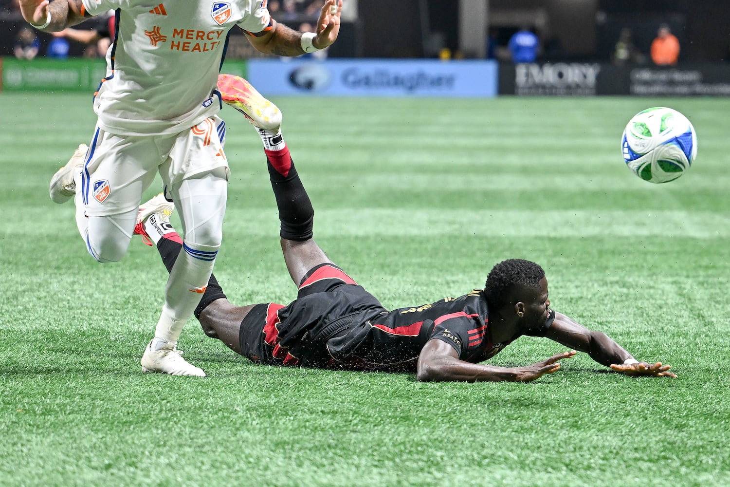 Atlanta United forward Jamal Thiaré (14) take a dive during the second half of a MLS soccer game Sunday, May 25, 2025 at the Mercedes-Benz Stadium. (Daniel Varnado/For the Atlanta Journal-Constitution)