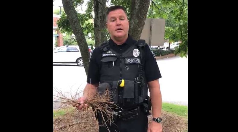 Marietta police  spokesman officer Chuck McPhilamy warns about a scam involving fraudsters selling pinestraw in a video posted to the department's Facebook.