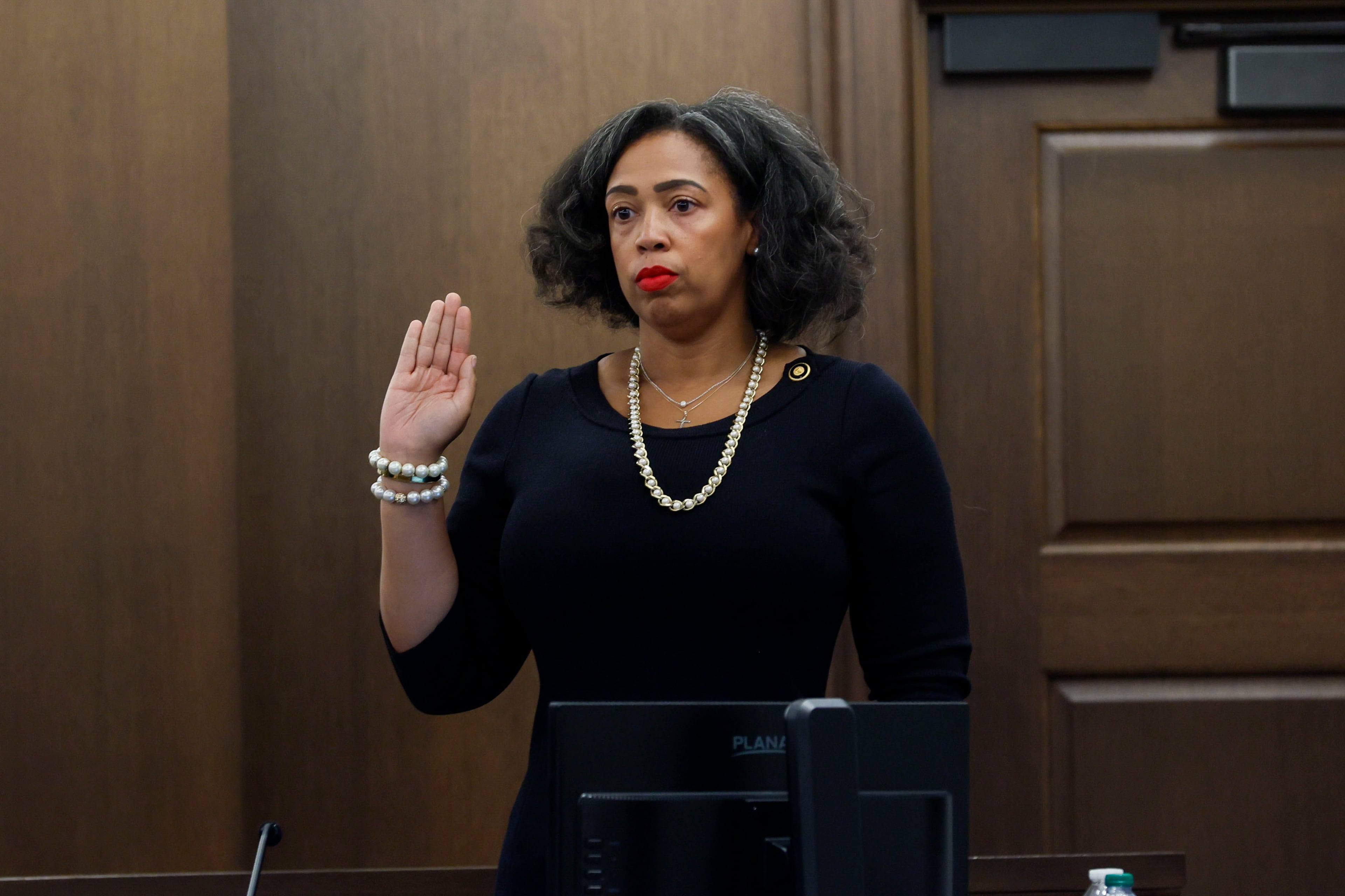Fulton County Superior Court Judge Shermela Williams swears to tell the truth before testifying on the first day of a misconduct hearing in Atlanta. (Miguel Martinez/AJC)