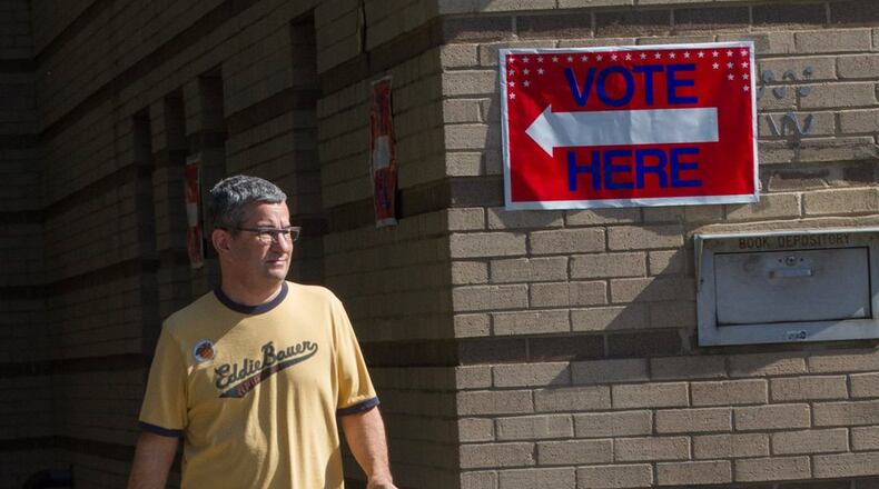 Michael Pelaia leaves the Ponce De Leon Branch Library after casting his ballot Thursday in Atlanta GA November 02 2017. STEVE SCHAEFER / SPECIAL TO THE AJC