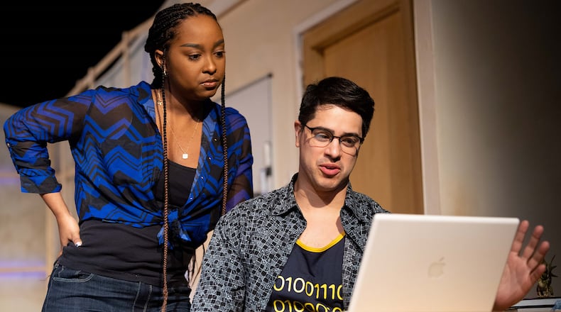 Irene Polk and Chris Hecke play analytical grad students in the romance “Completeness,” continuing through Feb. 12 at Stage Door Theatre.
Courtesy of Stage Door Theatre/Paul Ward Photography