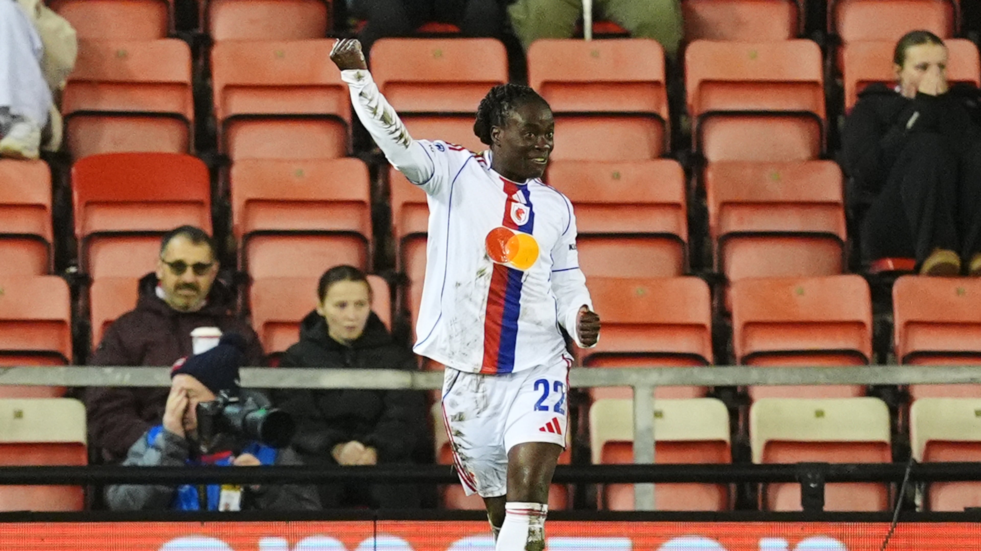 OL Lyonnes' Tabitha Chawinga celebrates scoring their side's first goal during a women's Champions League soccer match against Manchester United, Wednesday, Dec. 10, 2025, in Leigh, England. (Martin Rickett/PA via AP)