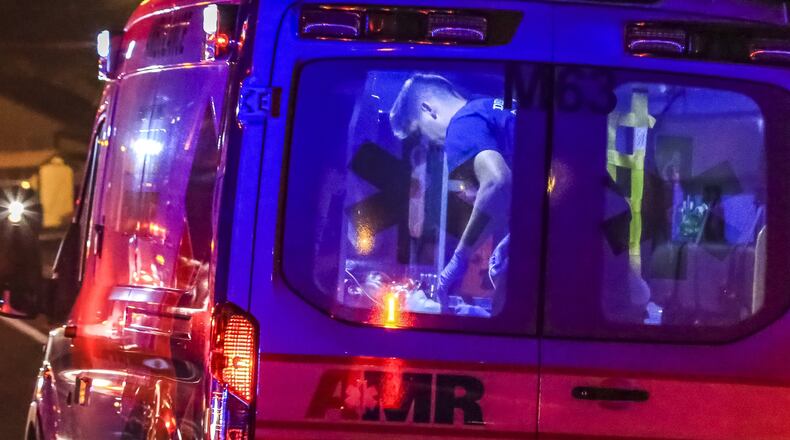 An American Medical Response ambulance transports a patient in August in DeKalb County. AMR provides ambulance service throughout the county, but its contract is now under review amid concerns of poor service.