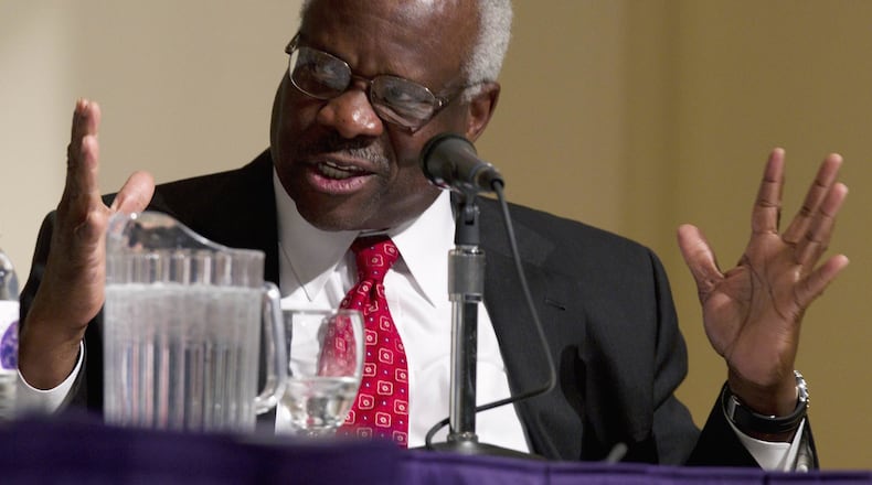FILE - In this Jan. 26, 2012 file photo, Supreme Court Justice Clarence Thomas speaks in Worcester, Mass. A hallmark in the search for a new Supreme Court justice is the secretive process for making sure the choice is kept under wraps until the president is ready to reveal it. (AP Photo/Michael Dwyer, File)