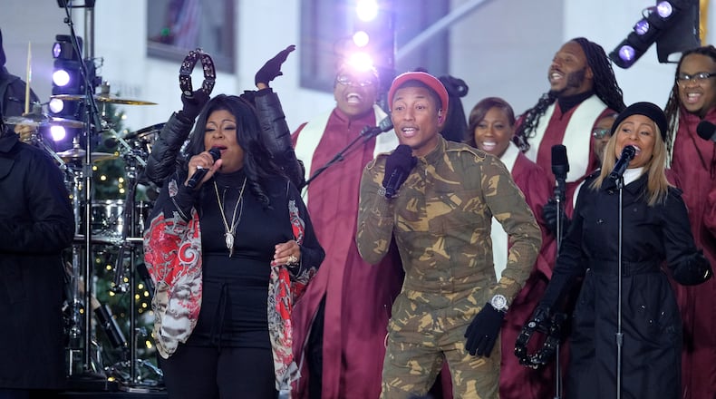 NEW YORK, NY - DECEMBER 09: (L-R) Kim Burrell and Pharrell Williams perform onstage during the Citi Concert Series on TODAY at Rockefeller Center on December 9, 2016 in New York City. (Photo by D Dipasupil/Getty Images for CITI)