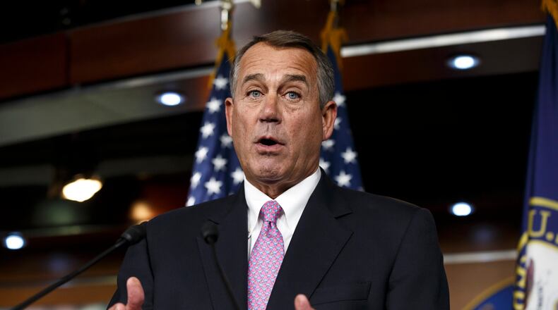FILE - In this Feb. 6, 2014 file photo, House Speaker John Boehner of Ohio speaks during a news conference on Capitol Hill in Washington. In a concession to President Barack Obama and Democratic lawmakers, Boehner said Tuesday the House will vote to increase the government's borrowing cap without trying to attach conditions sought by some Republicans. "We'll let his party give him the debt ceiling increase that he wants," Boehner said, hours before the expected evening vote. (AP Photo/J. Scott Applewhite, File) House Speaker John Boehner of Ohio speaks during a 2014 news conference on Capitol Hill