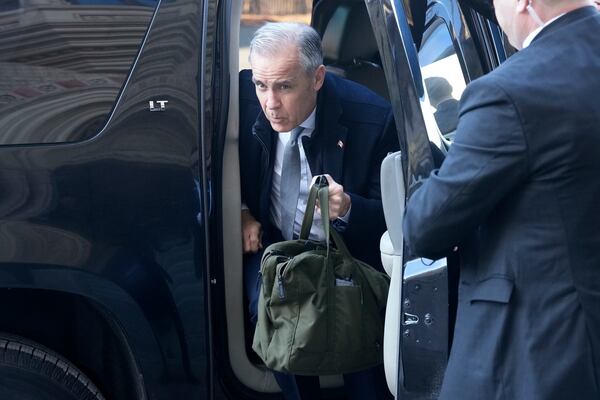 Prime Minister Mark Carney arrives on Parliament Hill in Ottawa on Thursday, March 27, 2025. Carney will chair a meeting of the Cabinet Committee on Canada-U.S. Relations and National Security. THE CANADIAN PRESS/Frank Gunn/The Canadian Press via AP) /The Canadian Press via AP)