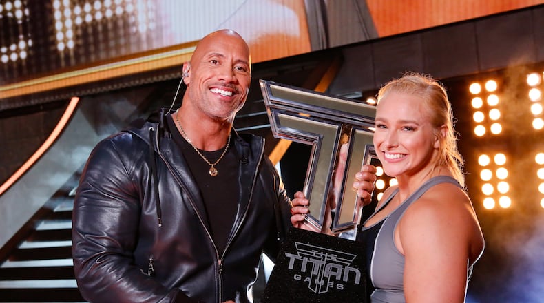 THE TITAN GAMES -- "The Titan Games Championship" Episode 110 -- Pictured: (l-r) Dwayne Johnson, Charity Wood -- (Photo by: Vivian Zink/NBC)