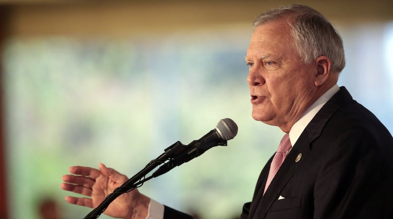 Gov. Nathan Deal spoke Tuesday to Georgia lawmakers during the Biennial Institute for Georgia Legislators, a prep event for the upcoming legislative session. But a lot of the action this week in Athens took place on the sidelines as potential candidates for a number of offices tried to line up support. (John Roark/Athens Banner-Herald via AP)