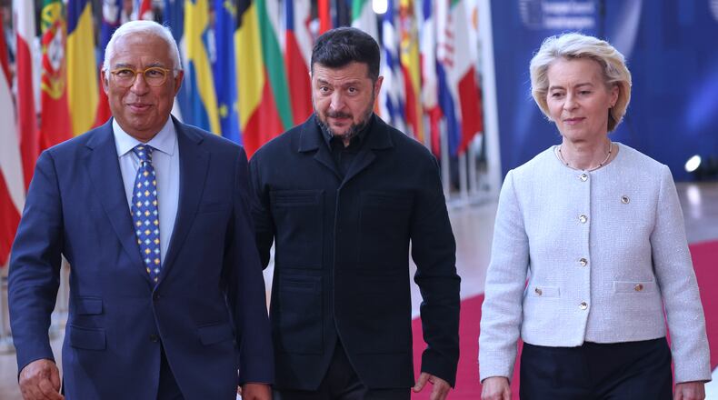 From left, European Council President Antonio Costa, Ukraine's President Volodymyr Zelenskyy and European Commission President Ursula von der Leyen arrive for the EU summit in Brussels, Thursday, June 18, 2026. (AP Photo/Omar Havana)