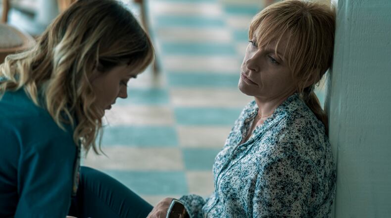 "Pieces of Her," based on Karin Slaughter's novel, is a Netflix drama series starring Bella Heathcote (left) as Andy Oliver and Toni Collette as Laura Oliver. Courtesy of Mark Rogers/Netflix © 2022