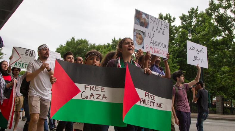 Protestors take to the streets at the emergency protest for the violence in Gaza in Downtown Atlanta, Georgia, on Tuesday, May 15, 2018. (REANN HUBER/REANN.HUBER@AJC.COM)