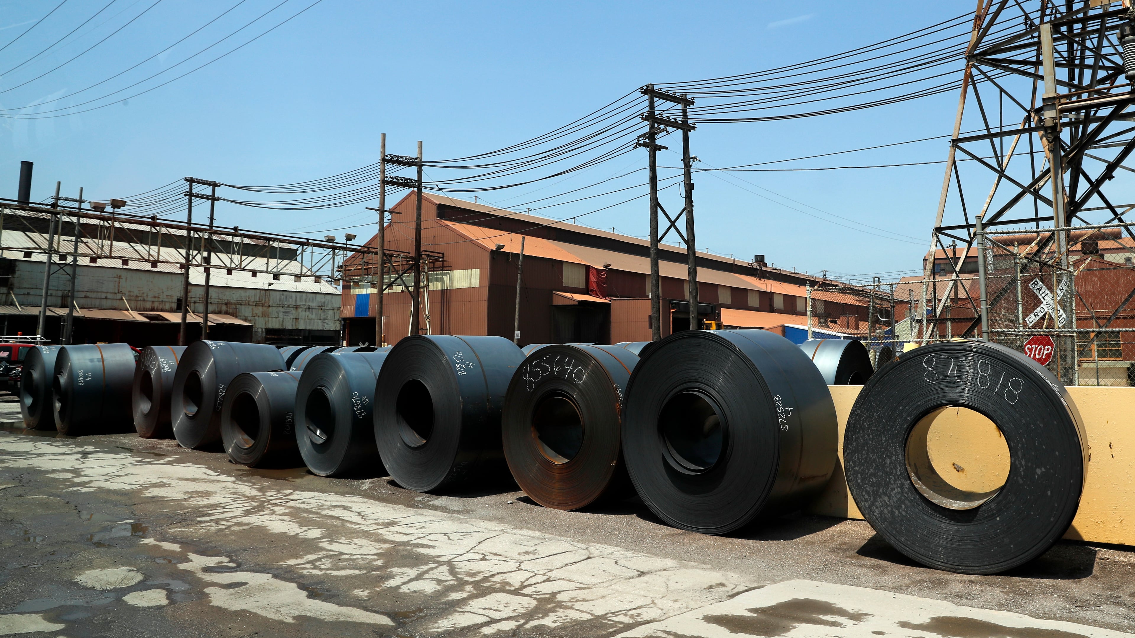FILE - Rolls of finished steel are seen at the U.S. Steel Granite City Works facility Thursday, June 28, 2018, in Granite City, Ill. (AP Photo/Jeff Roberson, File)