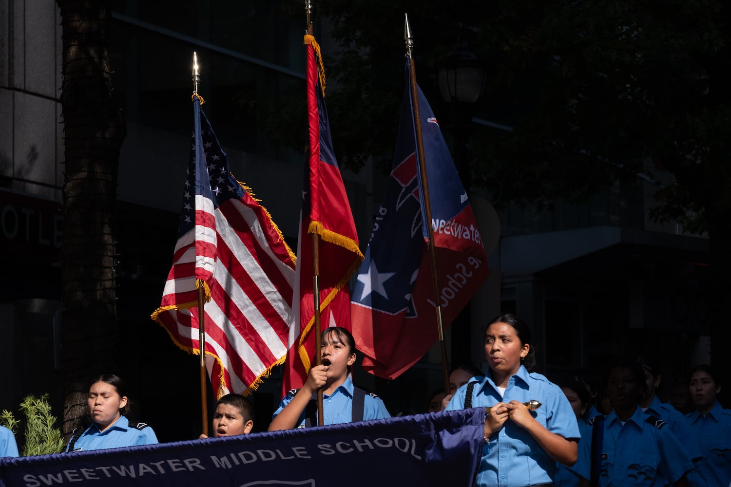 The Sweetwater Middle School Junior Leadership Corps marches during the Georgia Veterans Day Parade in Midtown Atlanta on Saturday, Nov. 8, 2025.   Ben Gray for the Atlanta Journal-Constitution