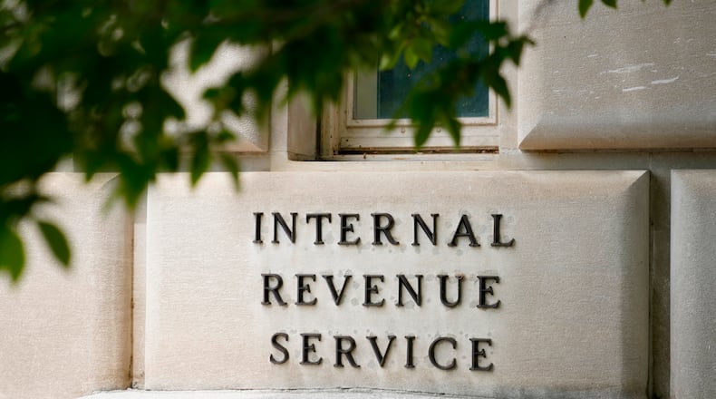 FILE - A sign outside the Internal Revenue Service building is photographed May 4, 2021, in Washington. (AP Photo/Patrick Semansky, File)
